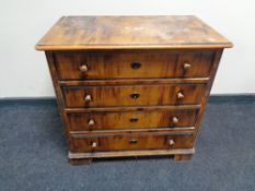 A continental scumbled pine four drawer chest.