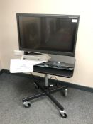 An Optelec ClearView C HD 24'' Speech TFT Video Magnifier on height adjustable trolley,
