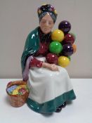 A Royal Doulton figure, The Old Balloon Seller, HN1315.