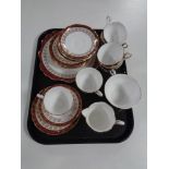 A tray containing a 21 piece Royal Stafford bone china tea service.