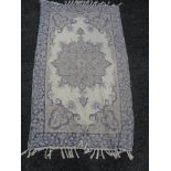 A fringed chain stitch rug,