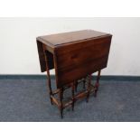 A Victorian style drop leaf table.