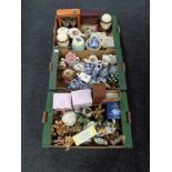 Three boxes containing miscellania to include boxed glassware, kitchen storage jars,