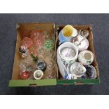 Two boxes containing assorted china and glassware to include pink glass dessert bowls, tea china,