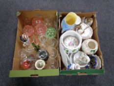 Two boxes containing assorted china and glassware to include pink glass dessert bowls, tea china,