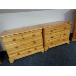 A pair of contemporary pine three drawer chests.