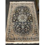 A fine Persian Nain rug,