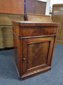 A late 19th century mahogany cabinet, fitted cupboard beneath.