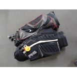 A Ping and Nike golf bag containing six assorted irons, drivers and putters.
