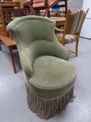 An early twentieth century bedroom chair in green dralon