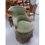 An early twentieth century bedroom chair in green dralon