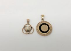 Two gold pendants