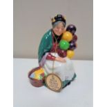 A Royal Doulton figure, The Old Balloon Seller, HN2129.