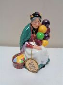 A Royal Doulton figure, The Old Balloon Seller, HN2129.