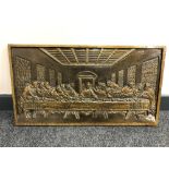 A gilt plaster panel depicting The Last Supper