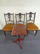 A set of three Edwardian mahogany dining chairs upholstered in golden dralon together with a