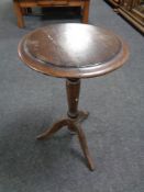 A 19th century pedestal wine table.