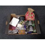 A box containing costume jewellery, solar string lights, etc.