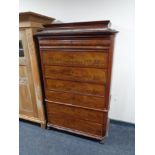 A 19th century continental mahogany seven drawer chest (as found).