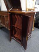 An early 20th century mahogany double door record cabinet.