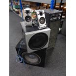 A Logitech sub speaker with further pair of speakers, a sub woofer amplifier,