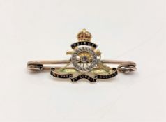 A gold diamond set Royal Artillery brooch CONDITION REPORT: 3.