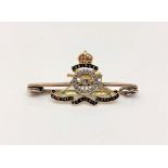 A gold diamond set Royal Artillery brooch CONDITION REPORT: 3.