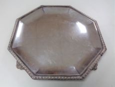 A George V silver octagonal salver on raised feet, 813g, George Howson,