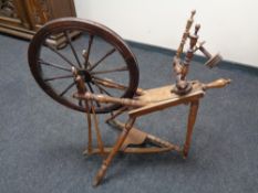 A 20th century spinning wheel.