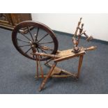 A 20th century spinning wheel.