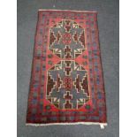 A Baluchi rug 131 cm x 70 cm