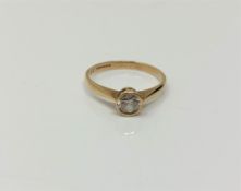 A 9ct gold solitaire ring set with cubic zirconia, size L, 1.3g.