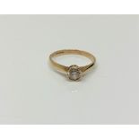 A 9ct gold solitaire ring set with cubic zirconia, size L, 1.3g.