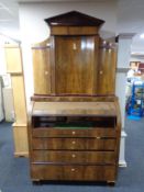 A late 19th century mahogany cylinder bureau bookcase,