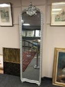 A silvered crested mirror, height 207 cm.