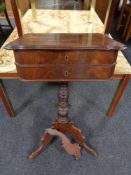 A 19th century mahogany work table on pedestal (as found).