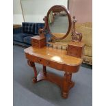 A Victorian mahogany Duchess style dressing table.