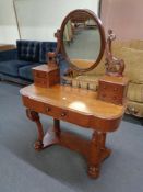 A Victorian mahogany Duchess style dressing table.