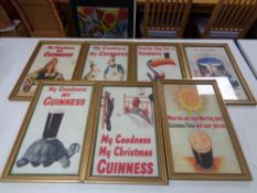 Seven gilt framed Guinness advertisements on paper.