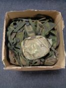 A box of army surplus webbing and pouches