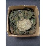 A box of army surplus webbing and pouches