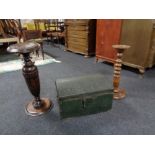 An antique pine dome topped trunk together with a beech smoker's stand and a plant stand.