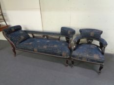 A late nineteenth century mahogany chaise longue and armchair