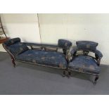 A late nineteenth century mahogany chaise longue and armchair