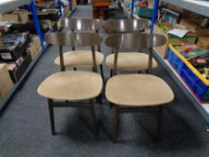 A set of four painted mid 20th century dining chairs.