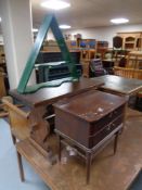 An oak refectory coffee table together with a painted triangular wall rack and mid century two