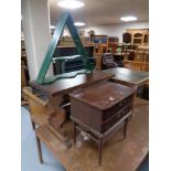 An oak refectory coffee table together with a painted triangular wall rack and mid century two