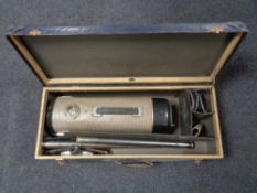 A cased 20th century vintage Danish cylinder hoover with accessories.