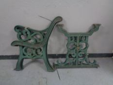 A pair of cast iron garden bench and table ends