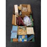 Three boxes containing miscellania to include boxed glassware, framed pictures, steam iron system,